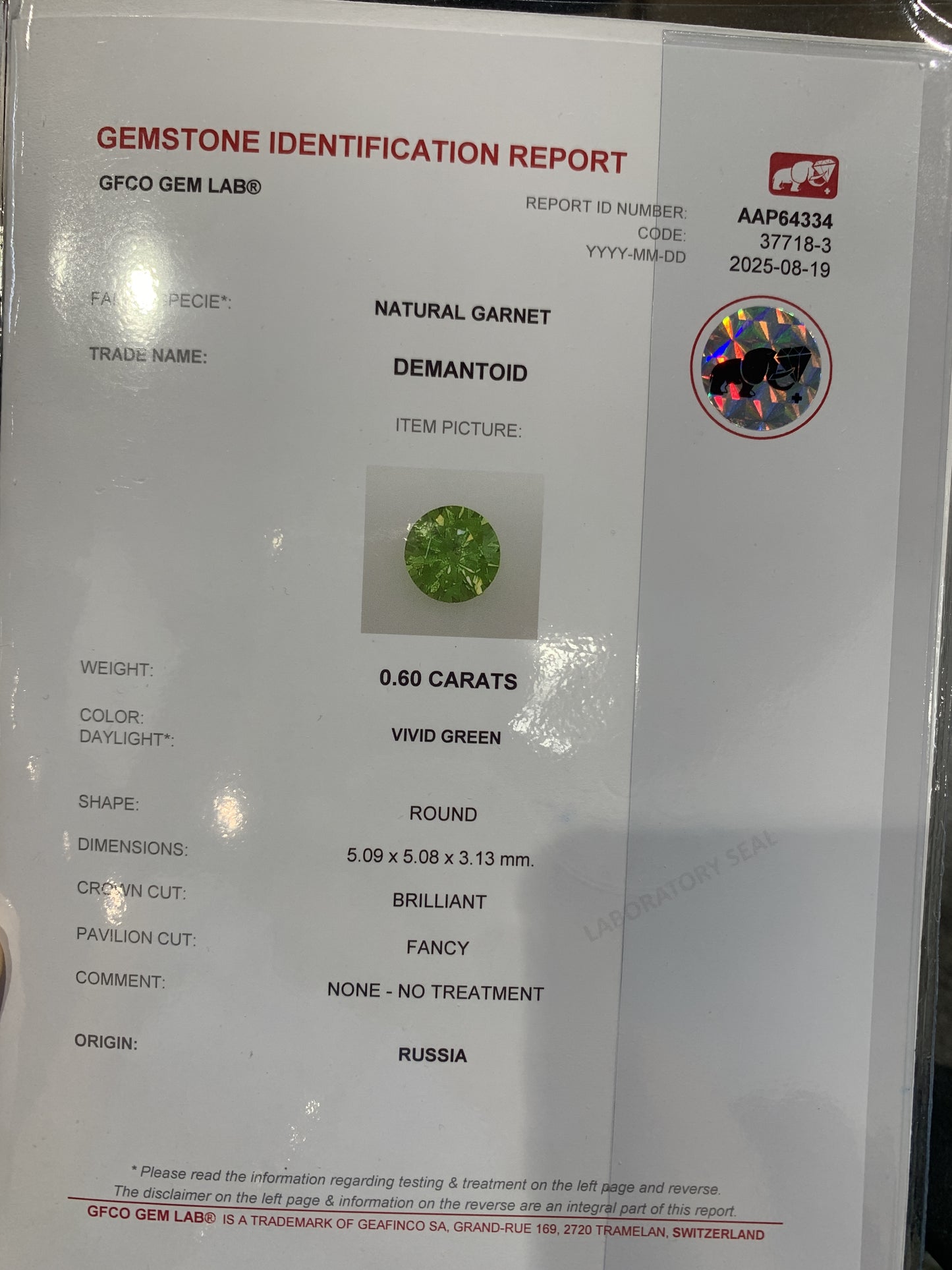 0.6 cts, Faceted vivid green Rusisan demantoid garnet