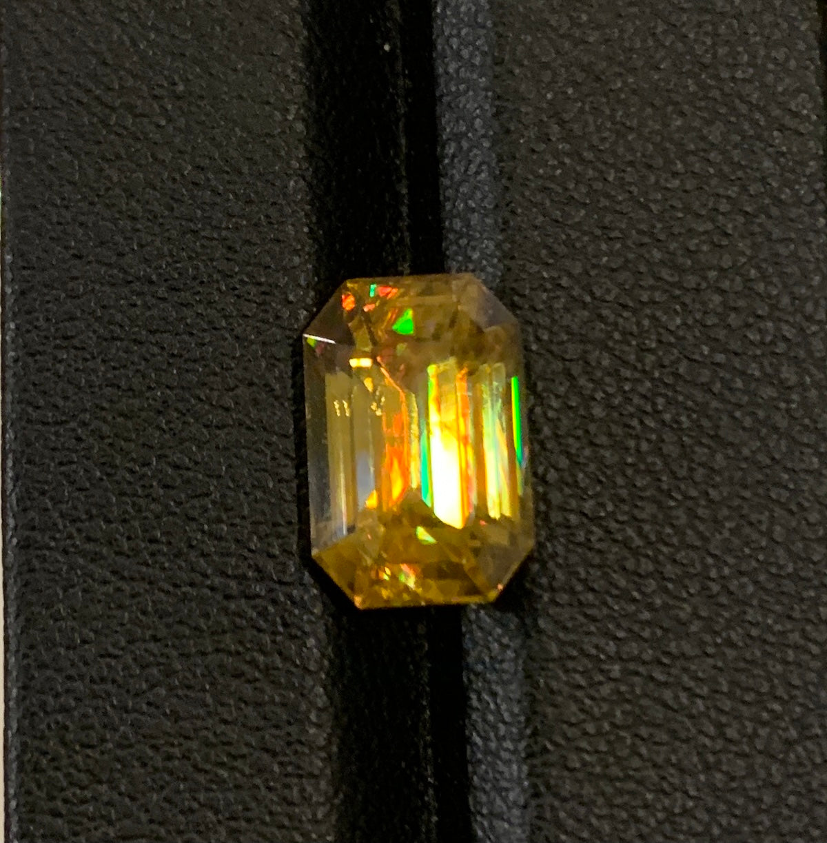 Yellow faceted sphen 5.4 ct