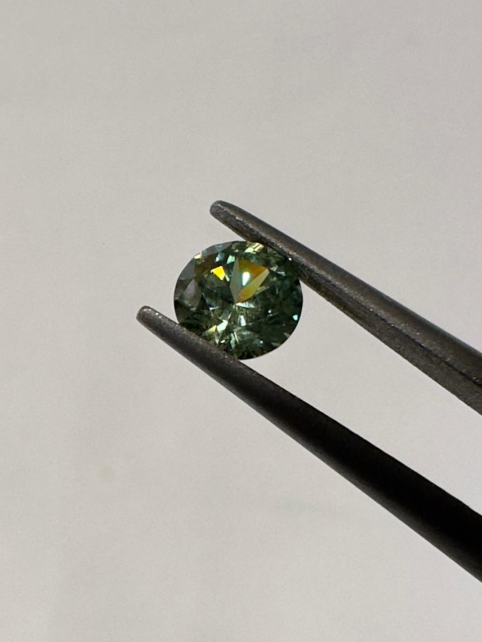 Faceted demantoid 0.6 ct