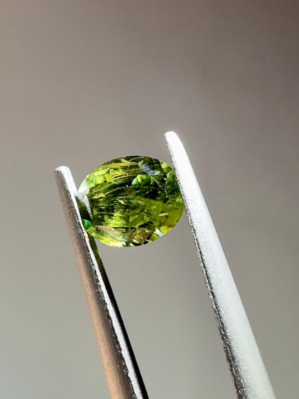 Oval demantoid garnet