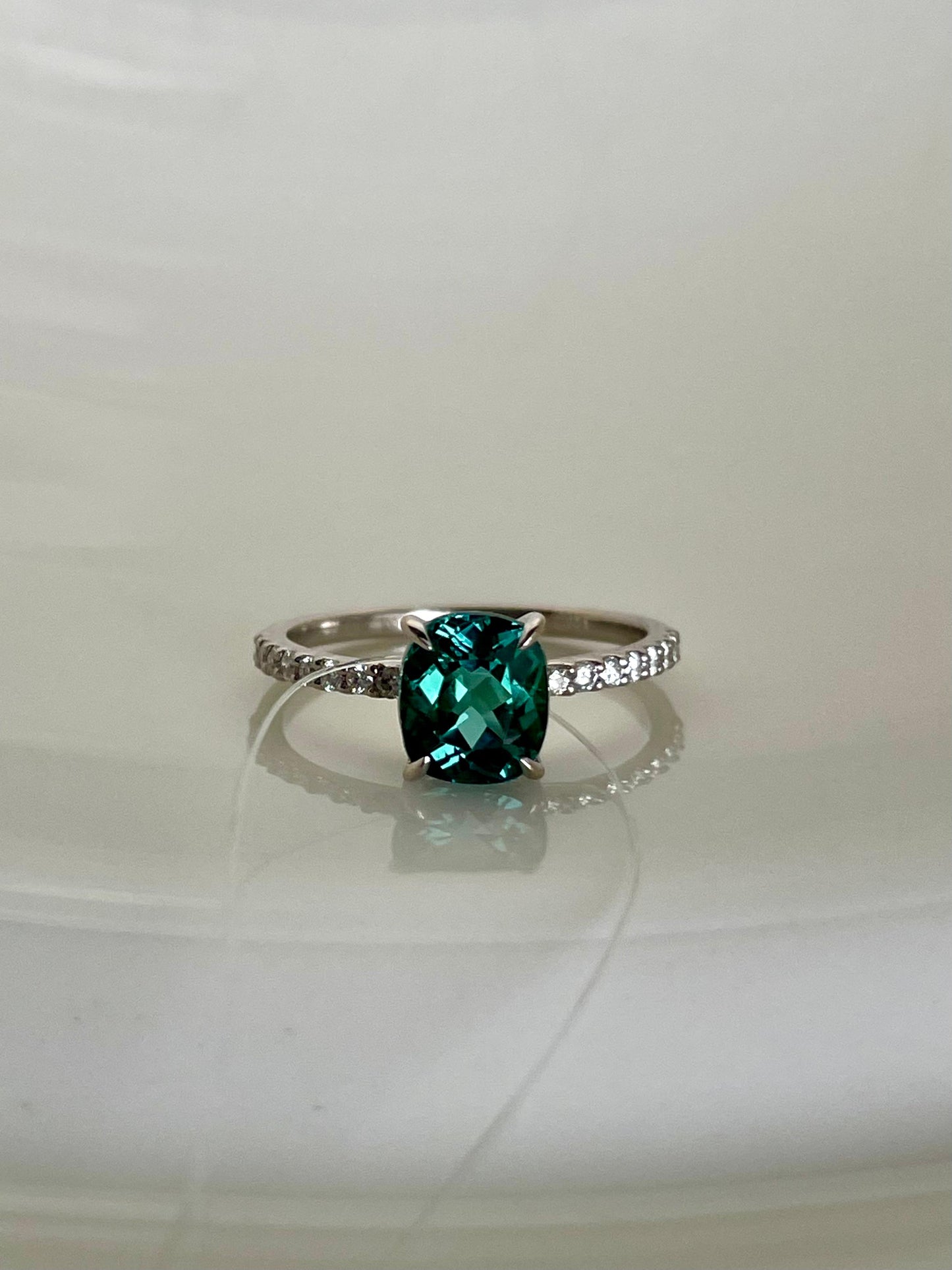 Faceted blue lagoon tourmaline diamond band golden ring