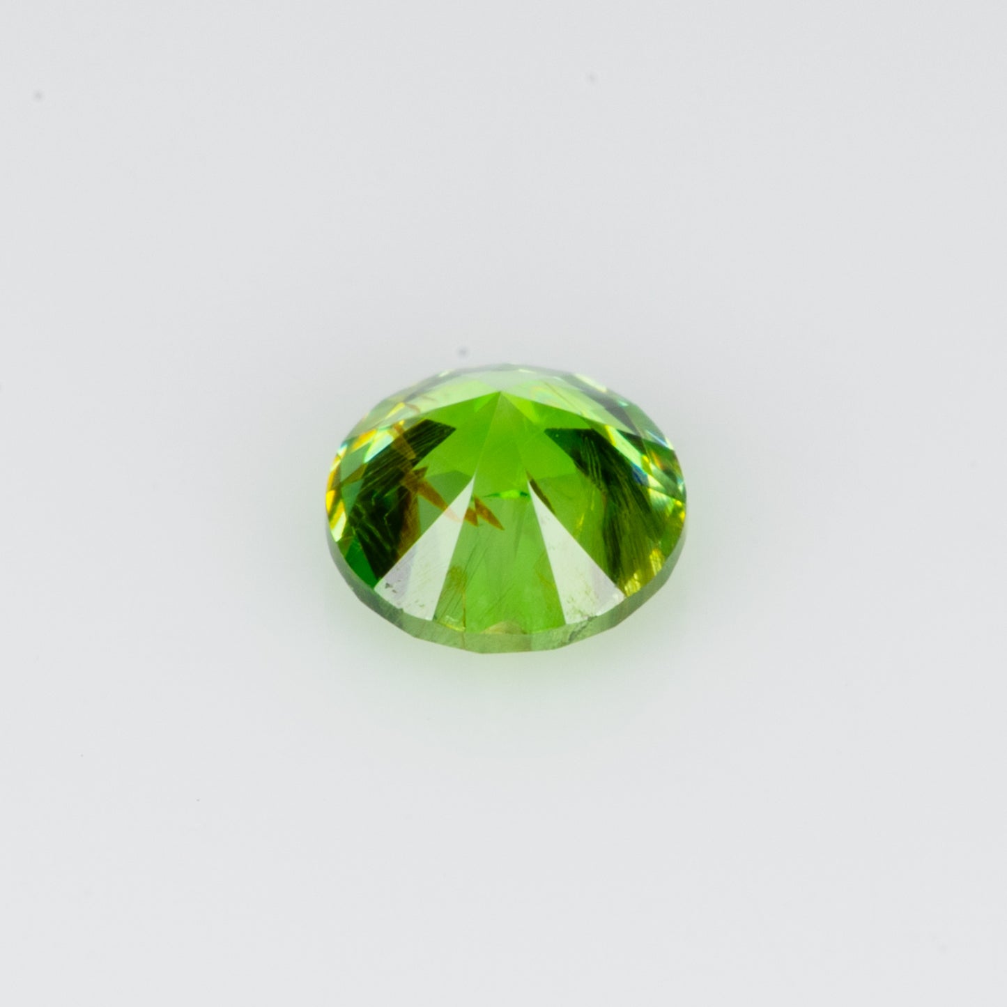 0.17 ct, Vivid green faceted Russian demantoid garnet