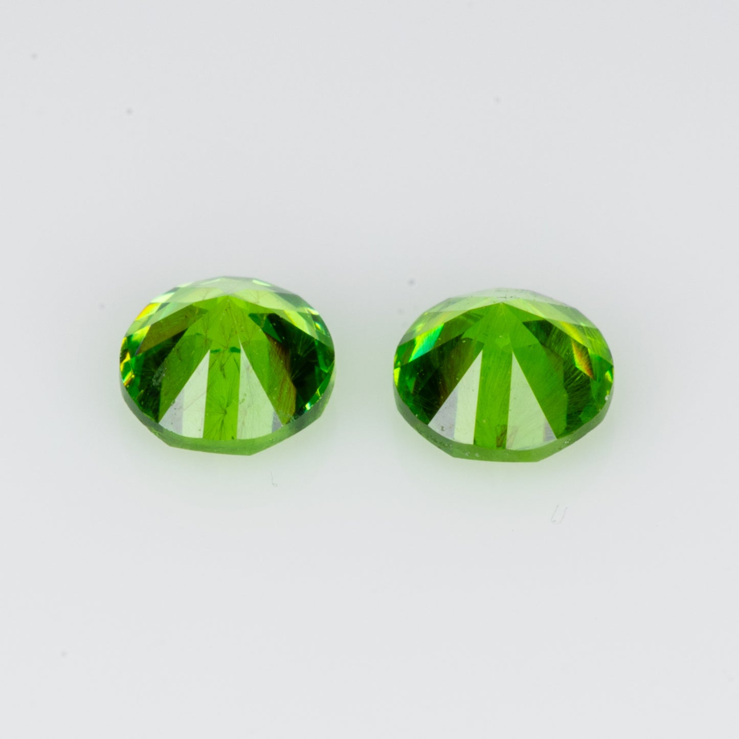 0.27 ct, Faceted vivid green russian demantoid pair
