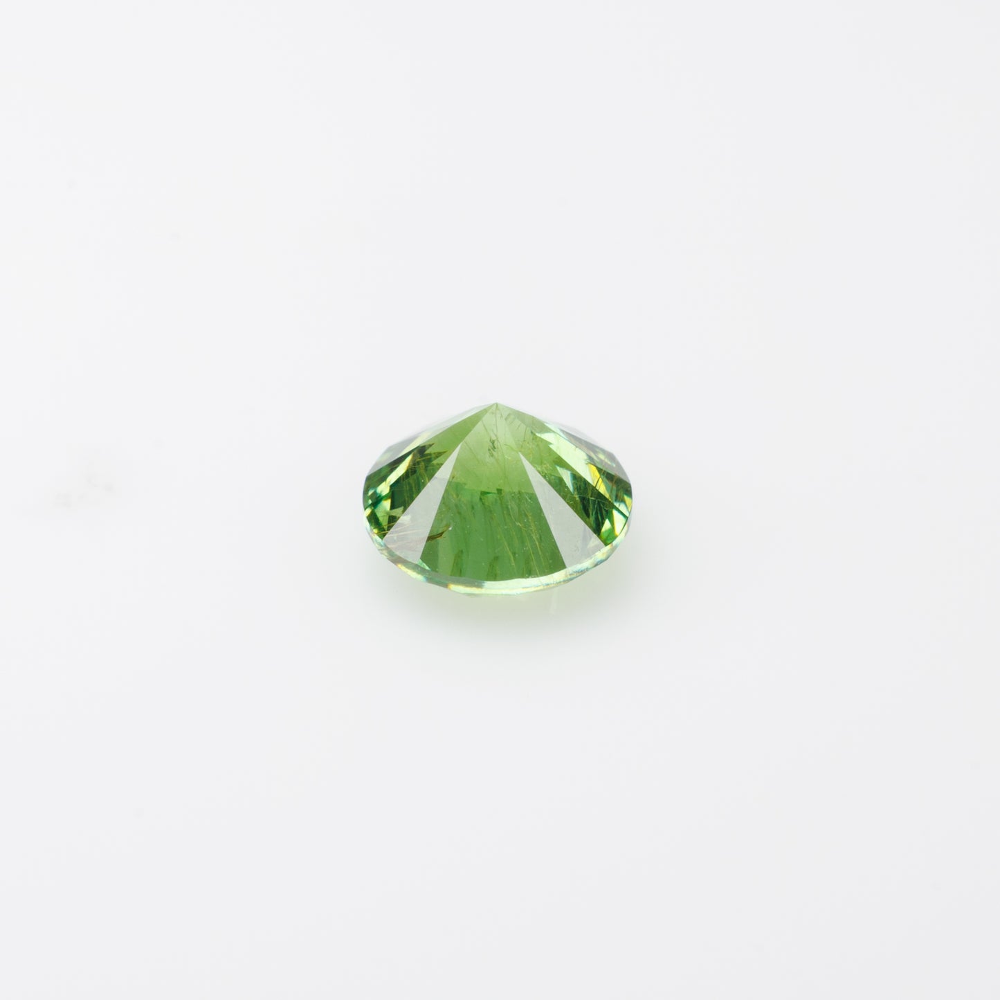 0.57 ct, Faceted Russian demantoid garnet