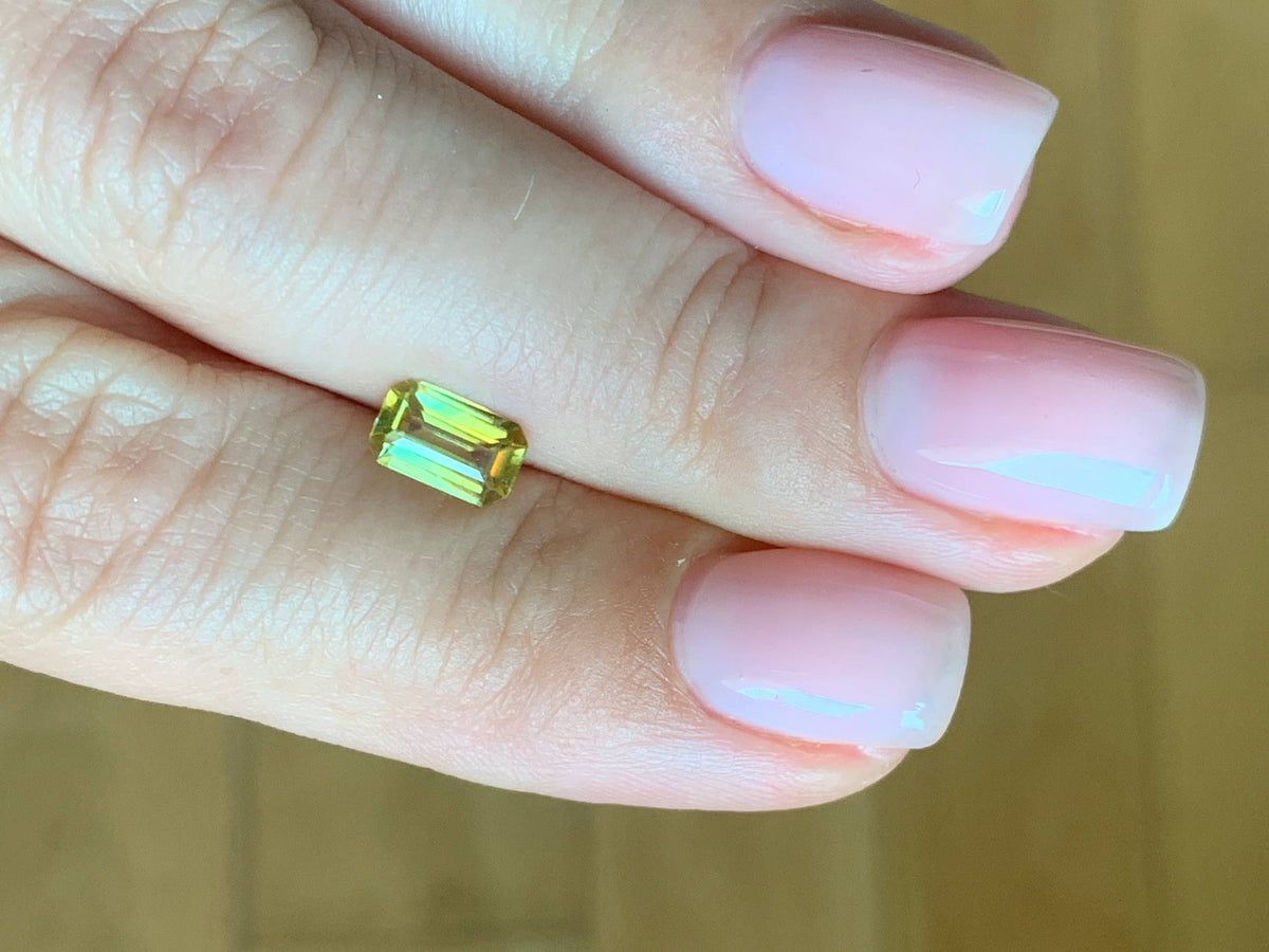 0.8 ct, Faceted vivid yellow sphene