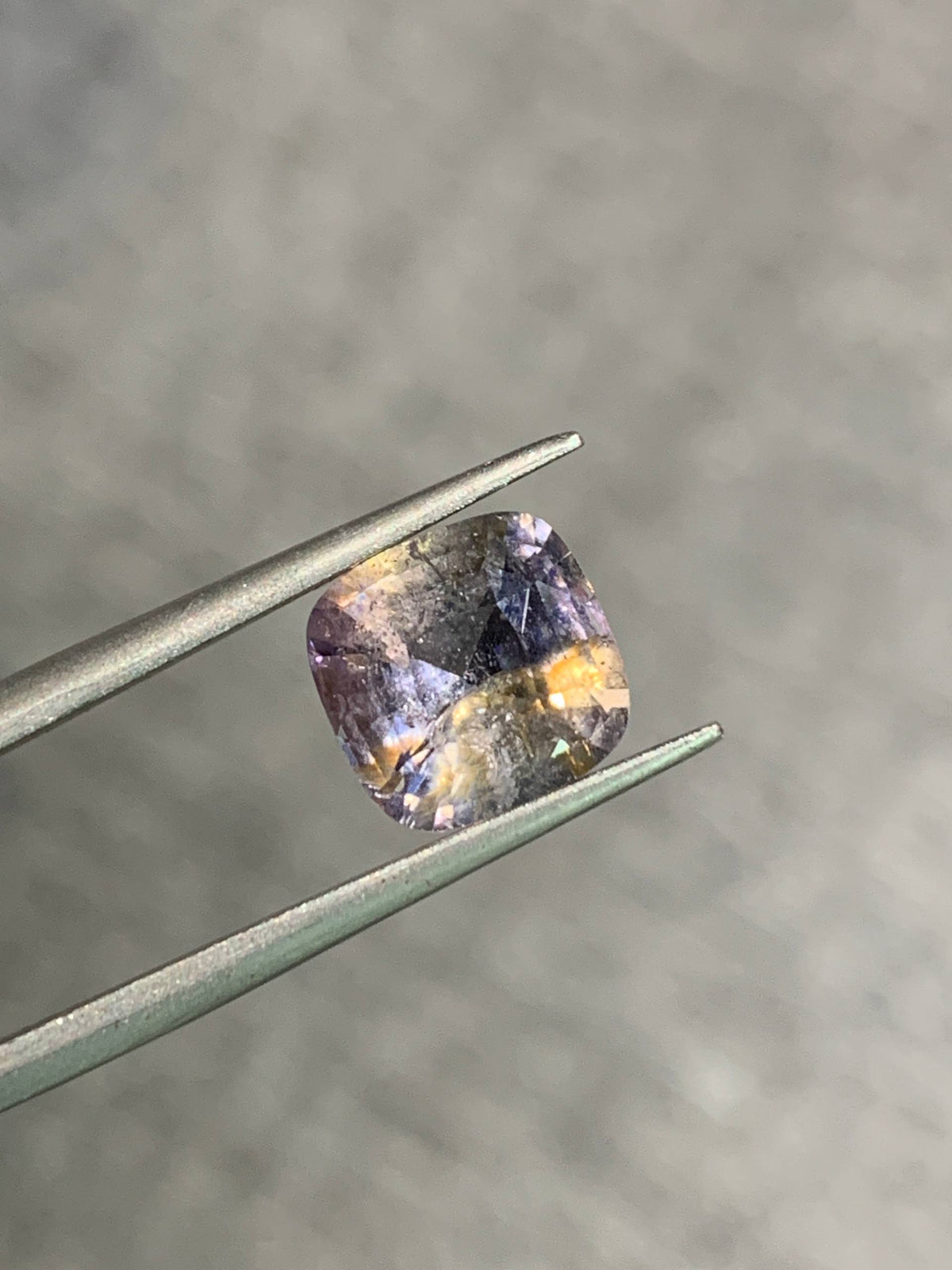 4 cts, Very unusual Orange violet faceted spinel