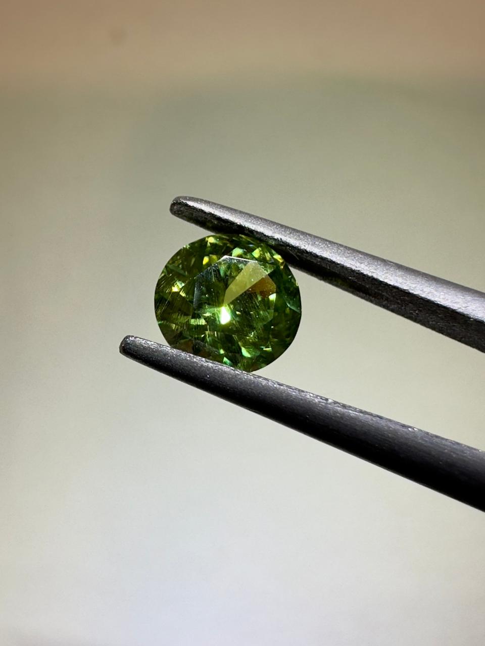 Faceted demantoid 0.6 ct
