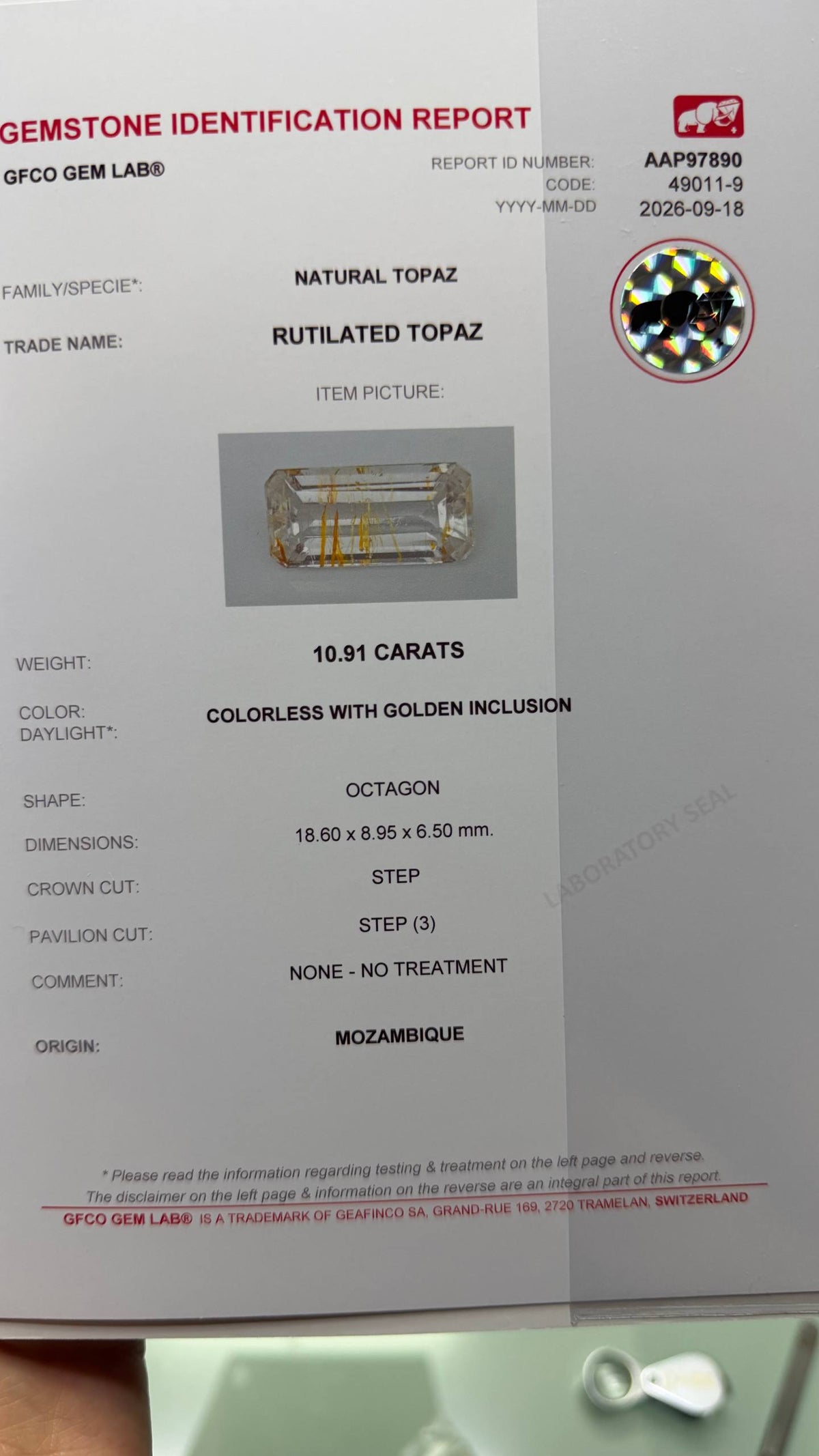 10.91 CTs, Rare colorless topaz with golden rutile inclusions