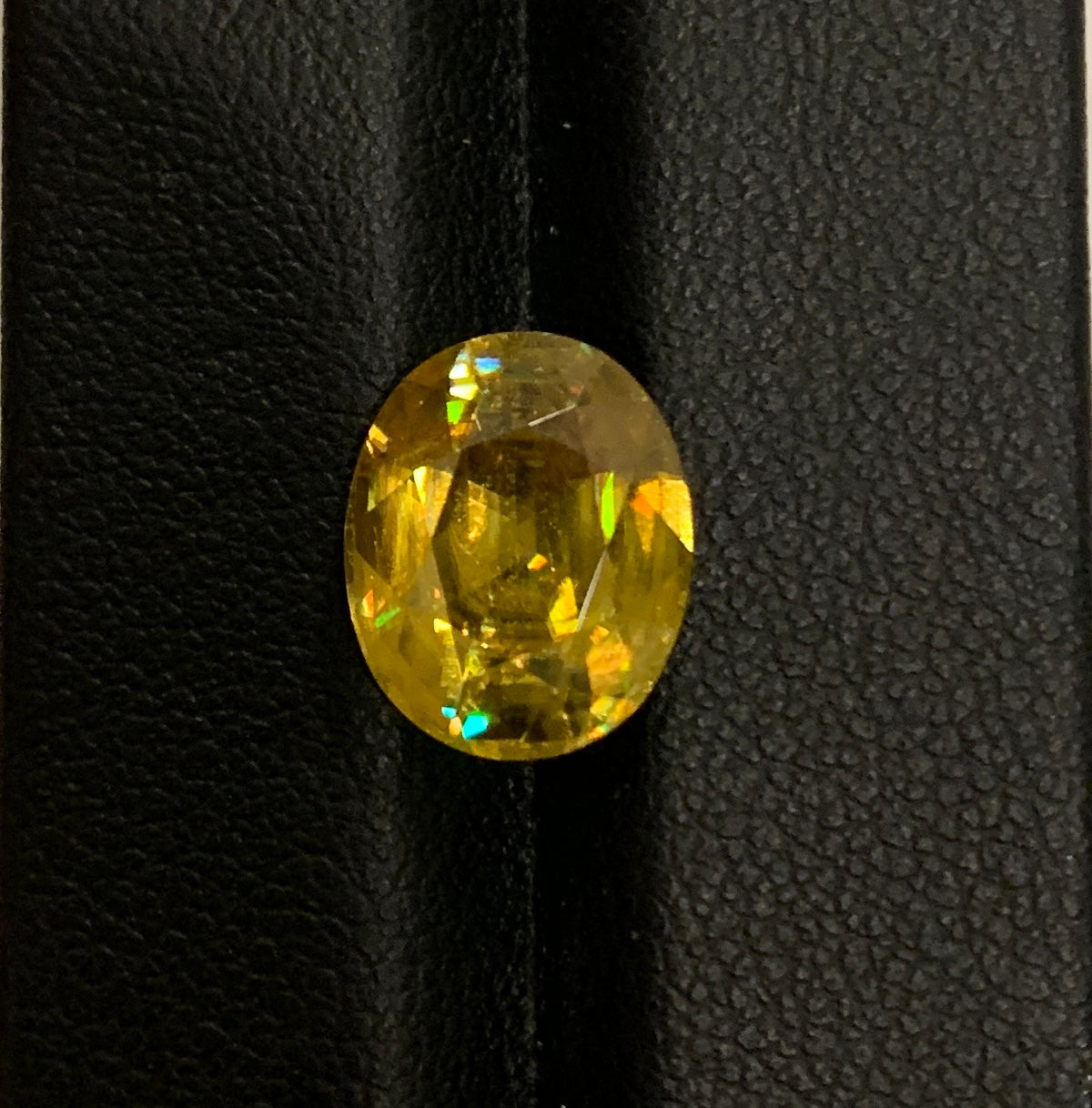 Yellow faceted sphen 5.85 ct