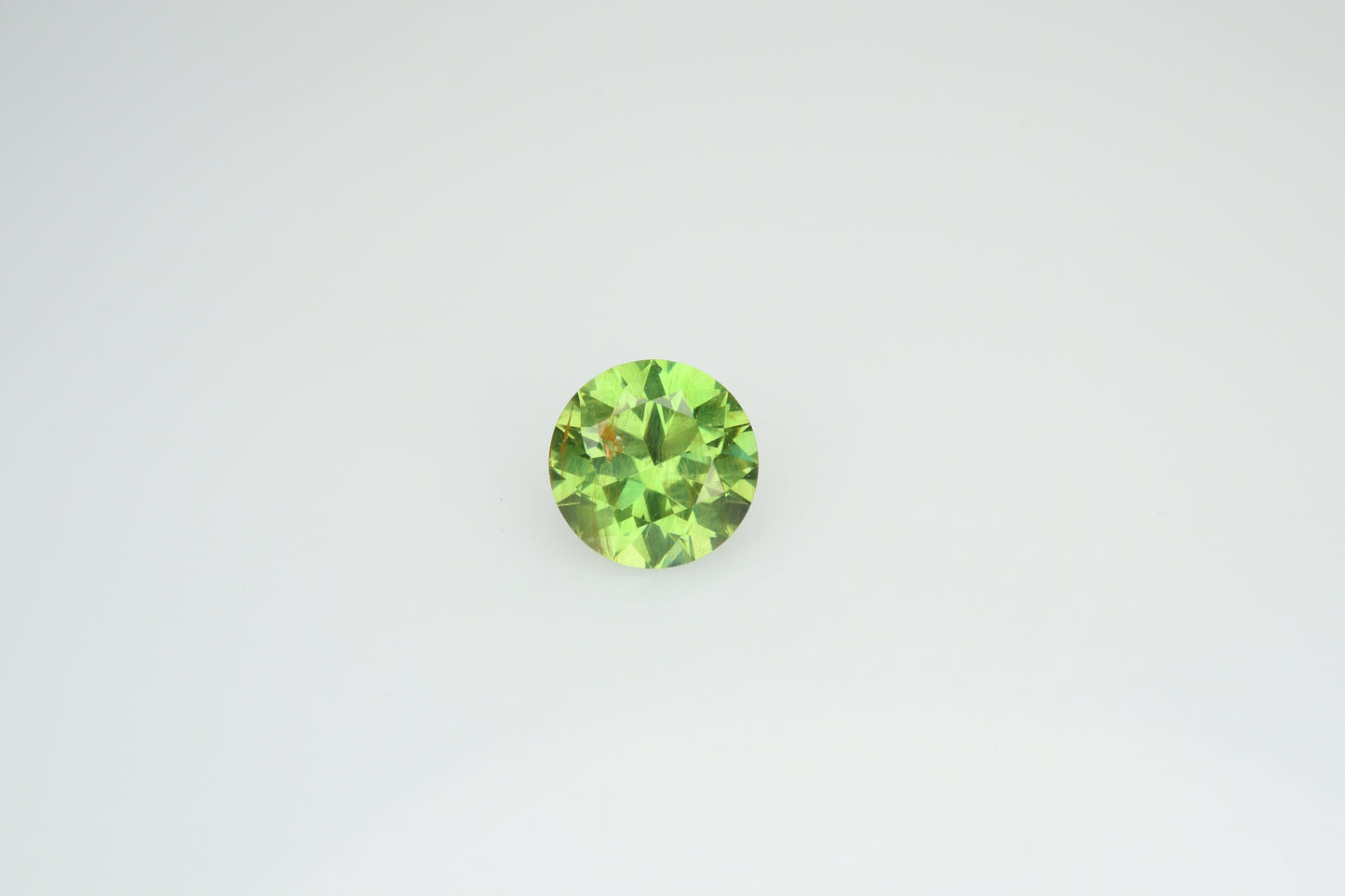 Faceted demantoid garnet 0.5 ct