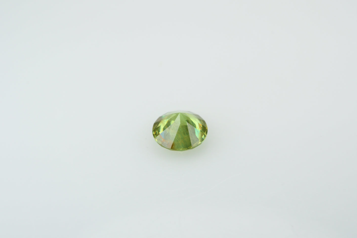 Faceted demantoid garnet 0.5 ct