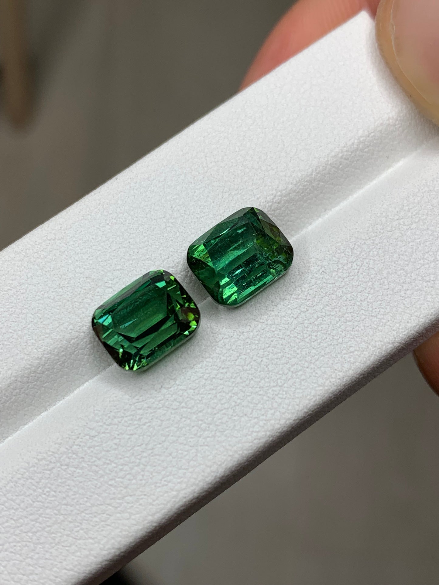 Faceted tourmaline pair, afghan green faceted tourmaline pair 9 ct