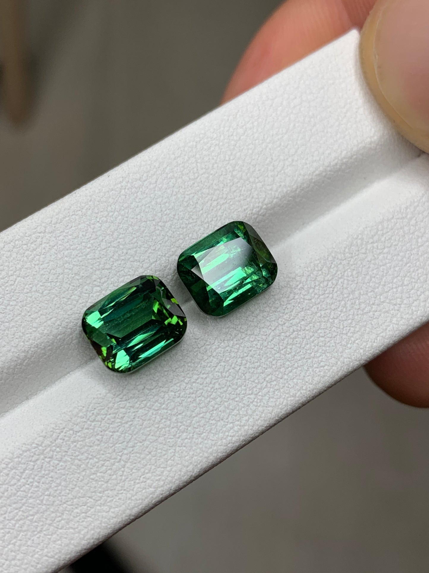Faceted tourmaline pair, afghan green faceted tourmaline pair 9 ct
