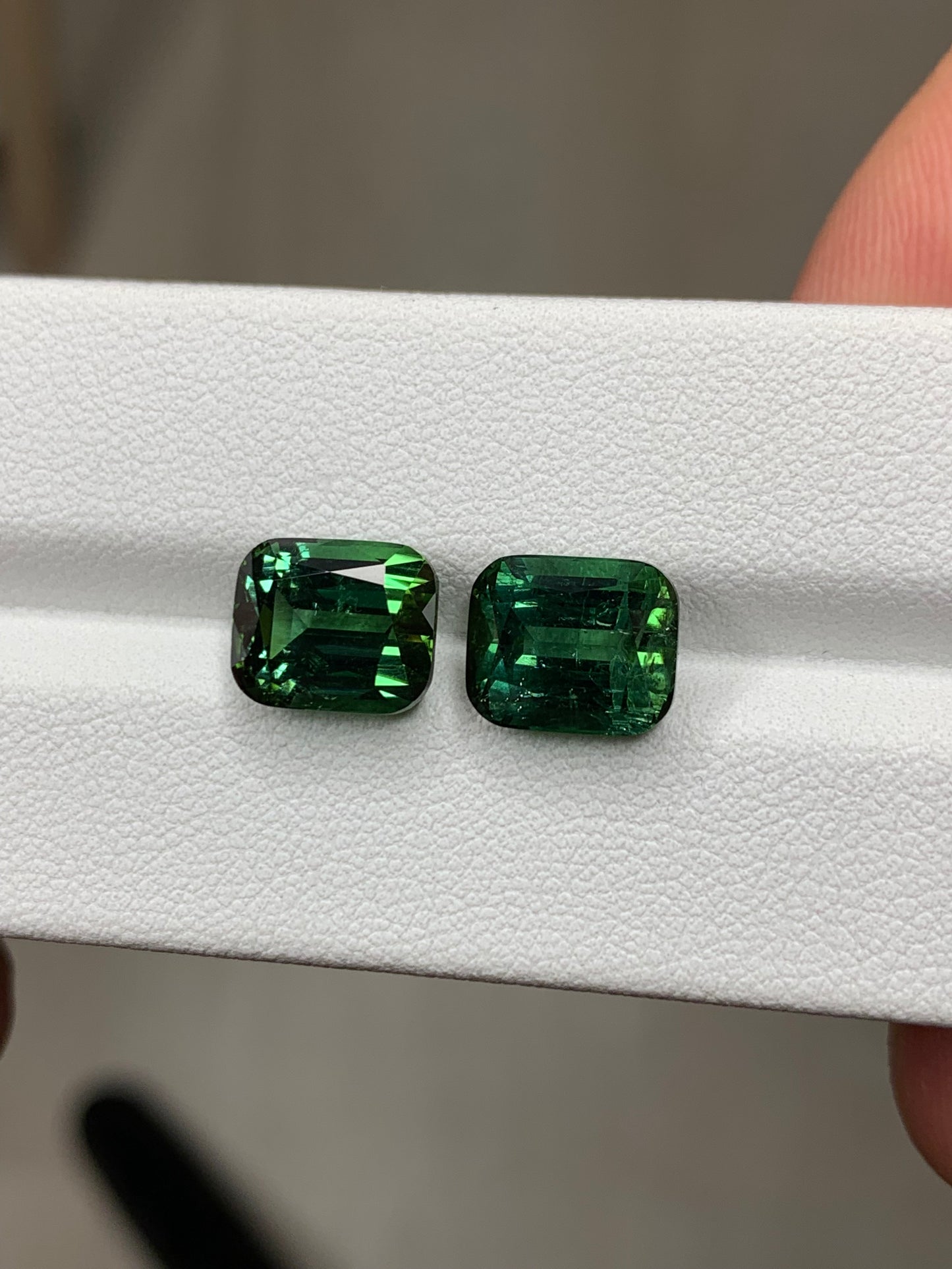 Faceted tourmaline pair, afghan green faceted tourmaline pair 9 ct