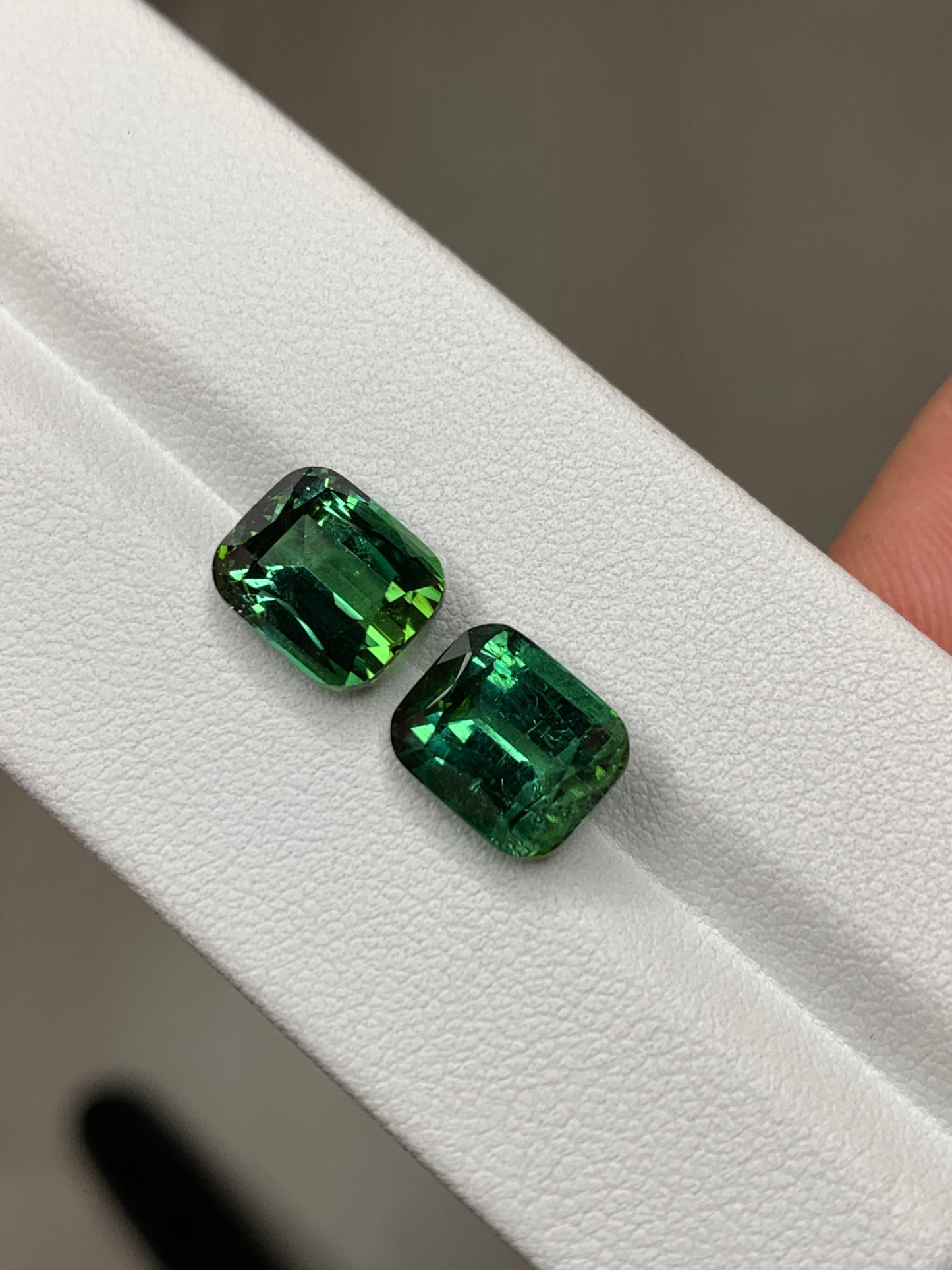Faceted tourmaline pair, afghan green faceted tourmaline pair 9 ct