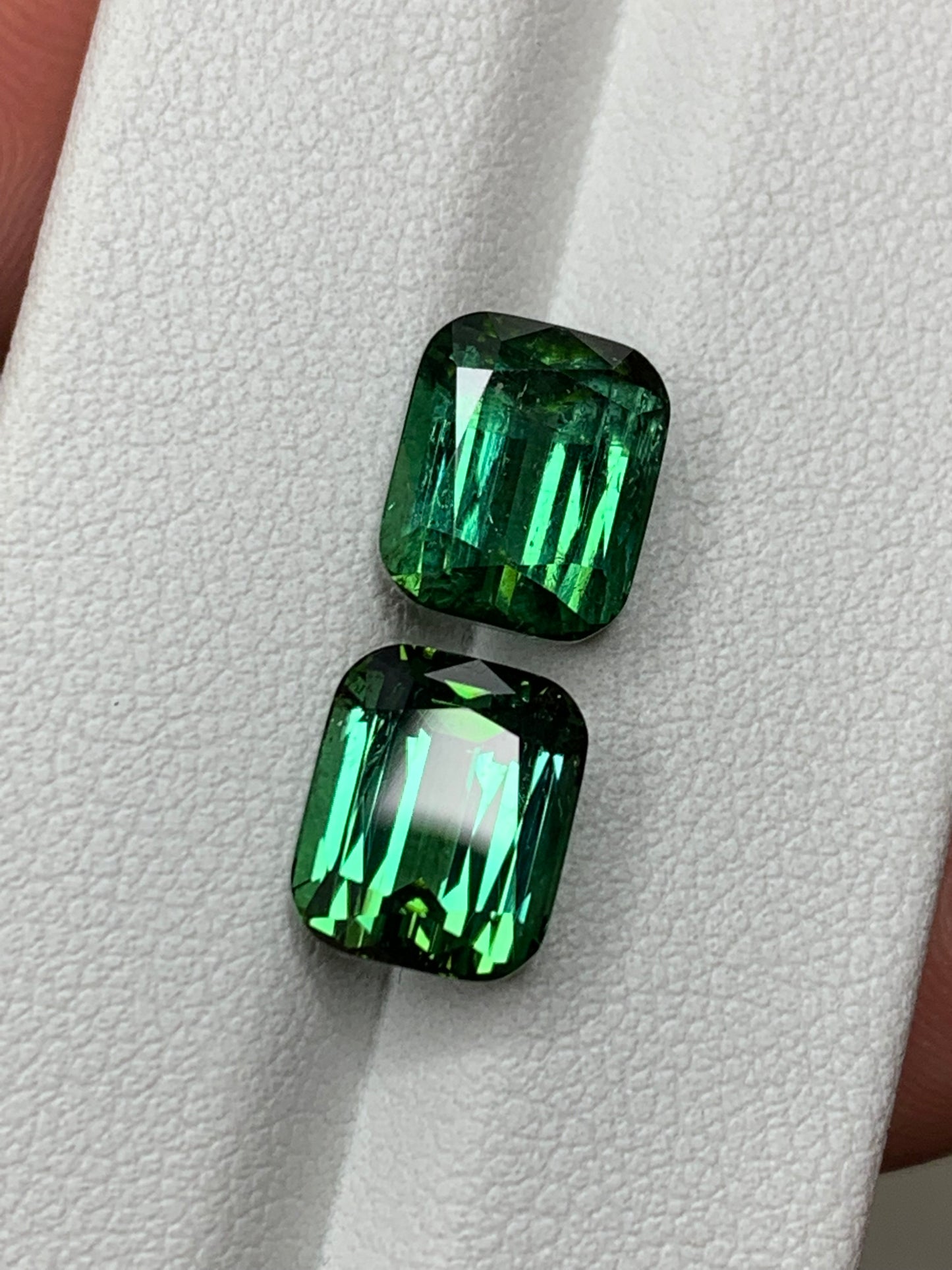 Faceted tourmaline pair, afghan green faceted tourmaline pair 9 ct
