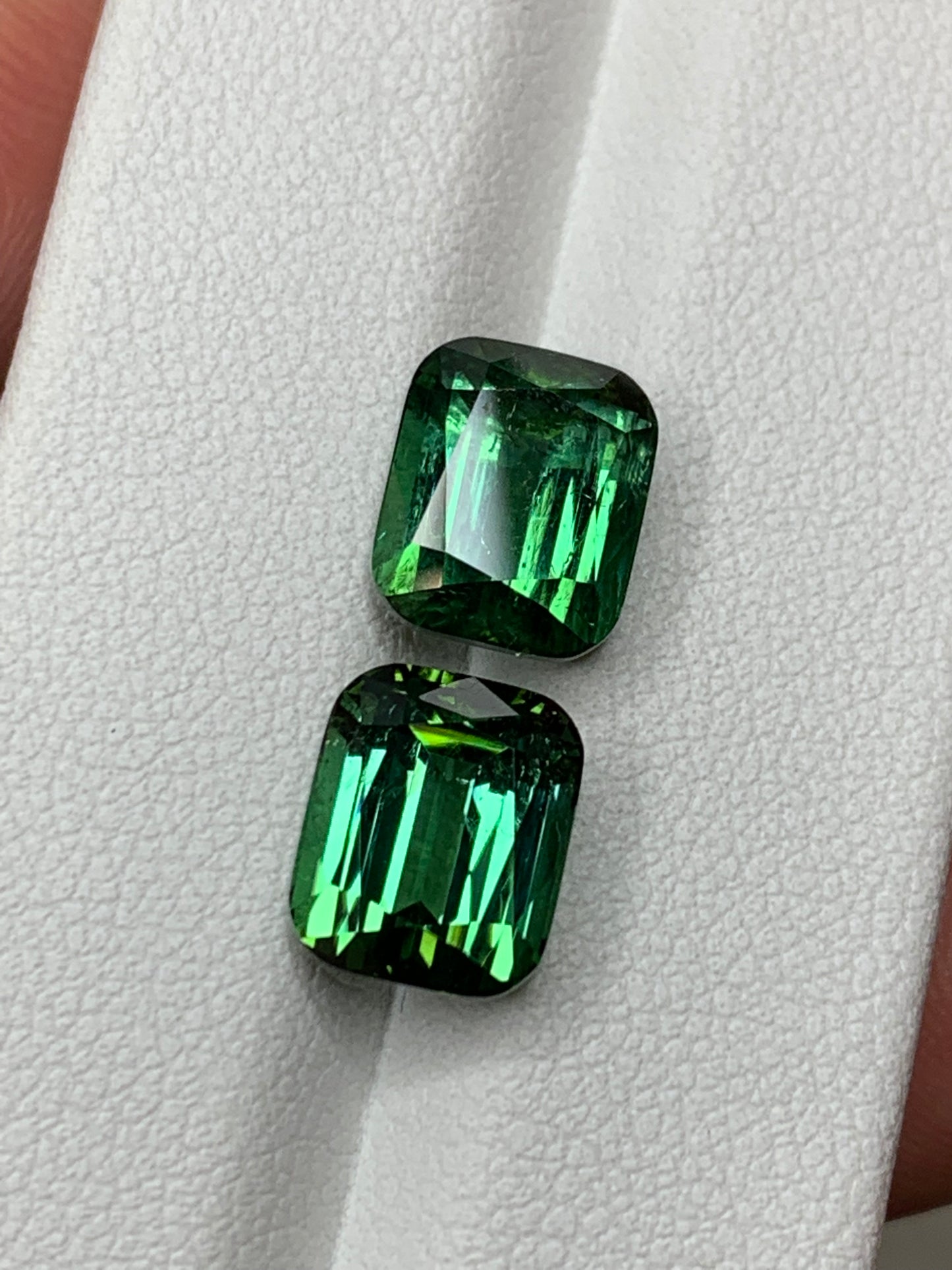 Faceted tourmaline pair, afghan green faceted tourmaline pair 9 ct
