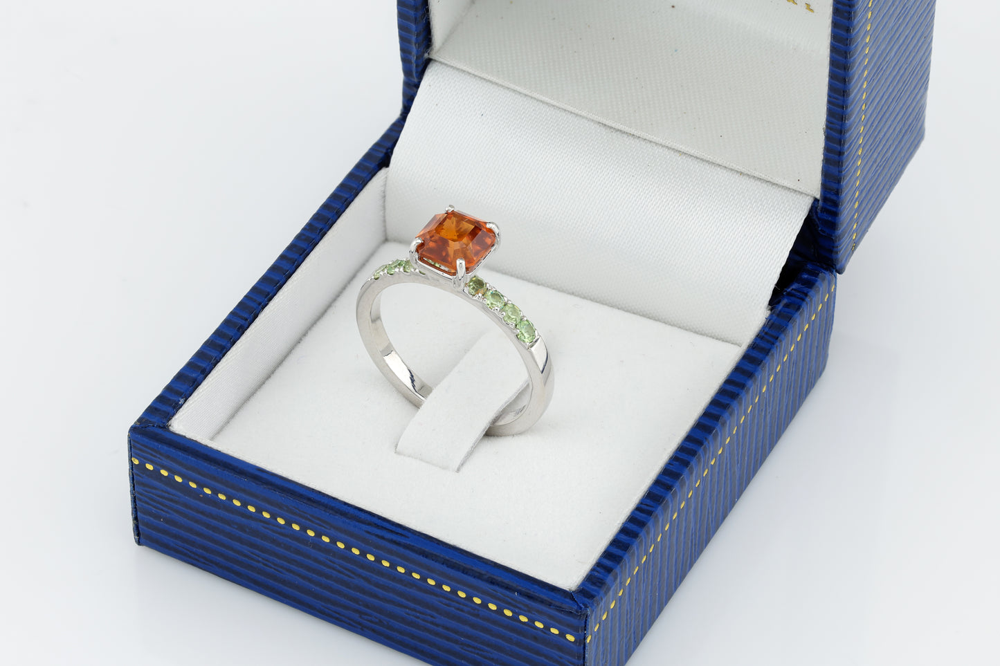 Faceted orange garnet silver ring