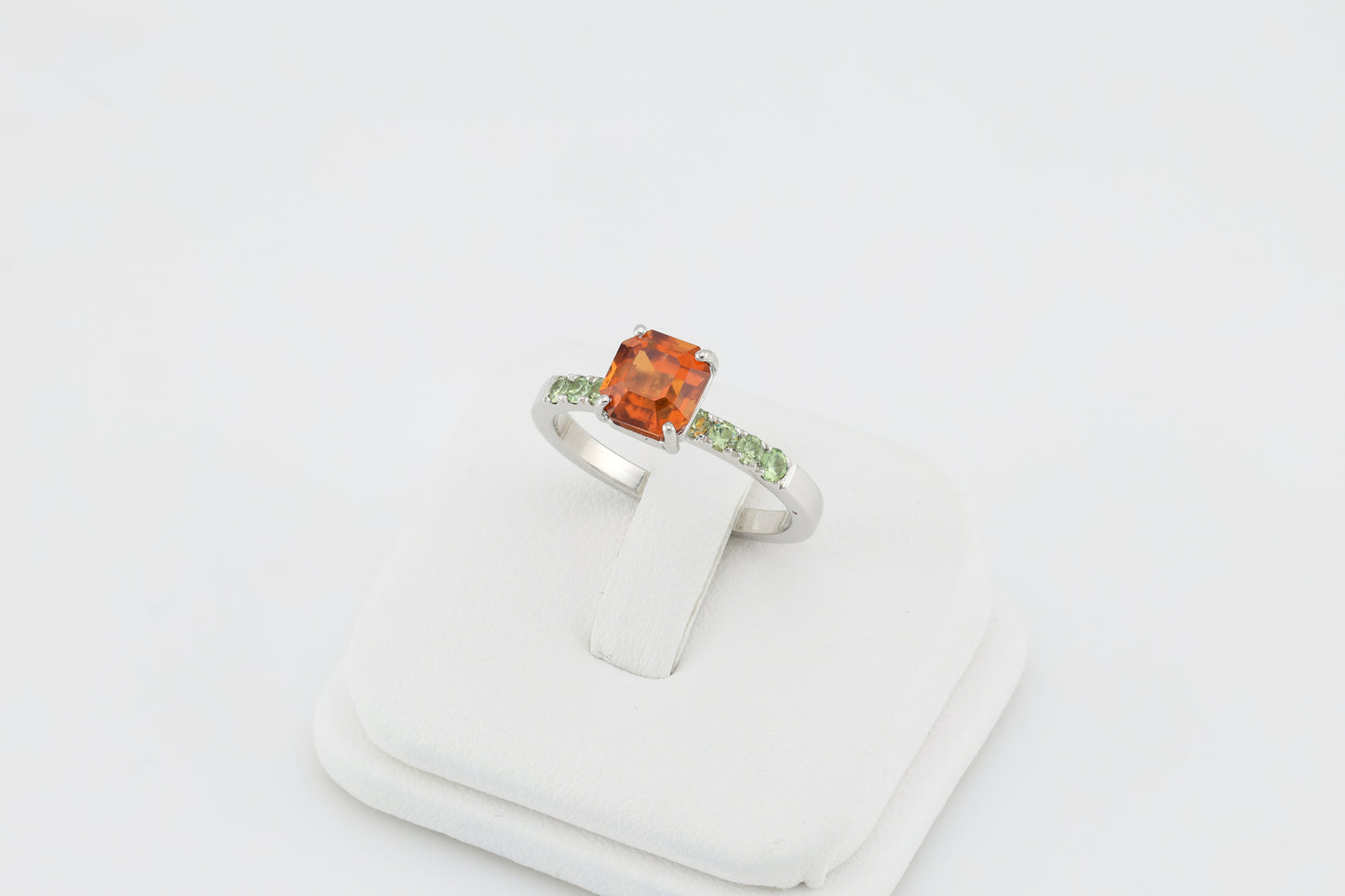 Faceted orange garnet silver ring