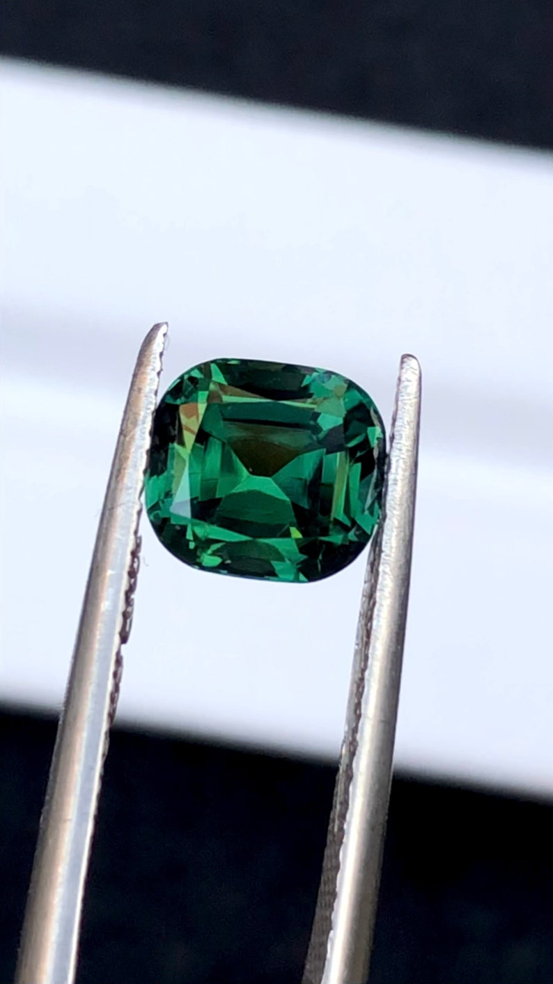 Faceted tourmaline rare green color 1.65 ct