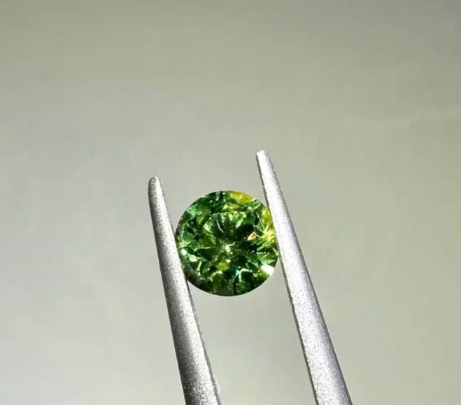 Faceted demantoid garnet 0.28 ct