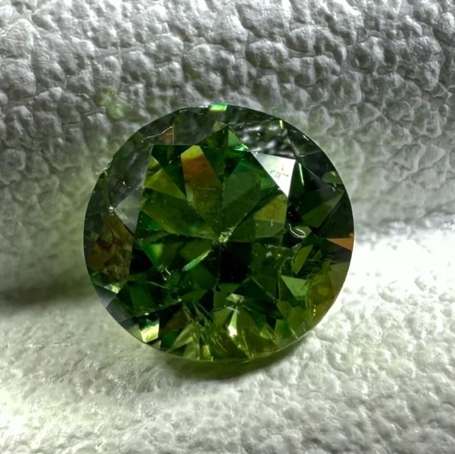 Faceted demantoid garnet 0.28 ct