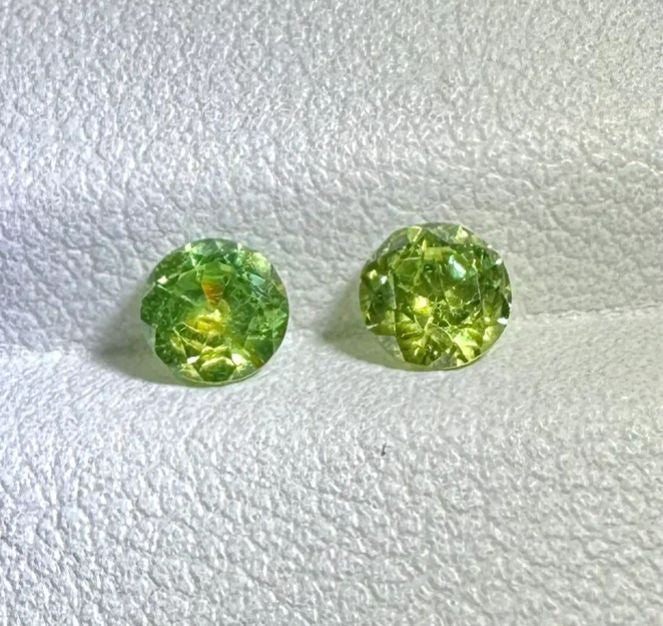 Faceted demantoid pair