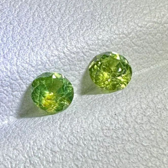 Faceted demantoid pair