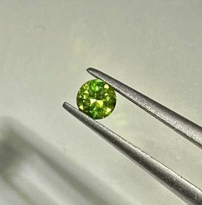 Faceted demantoid garnet