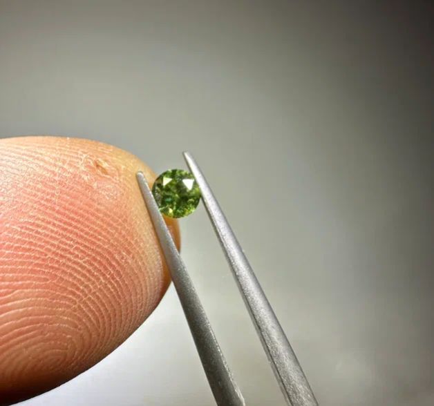 Faceted demantoid garnet