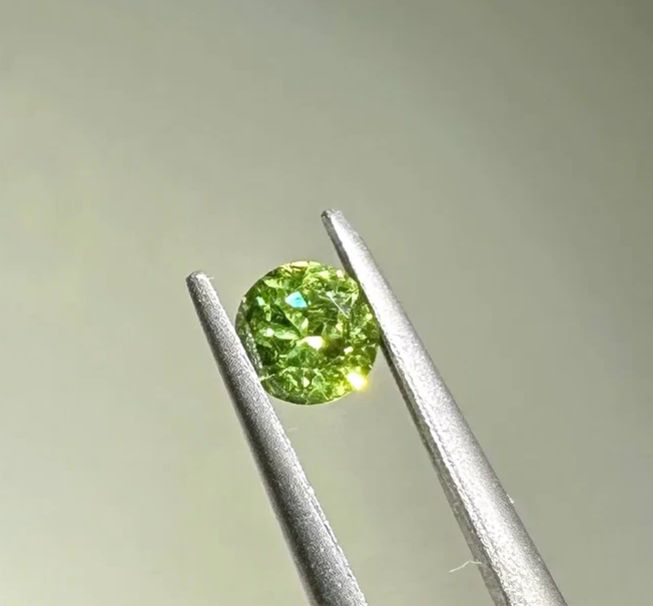 Faceted demantoid garnet