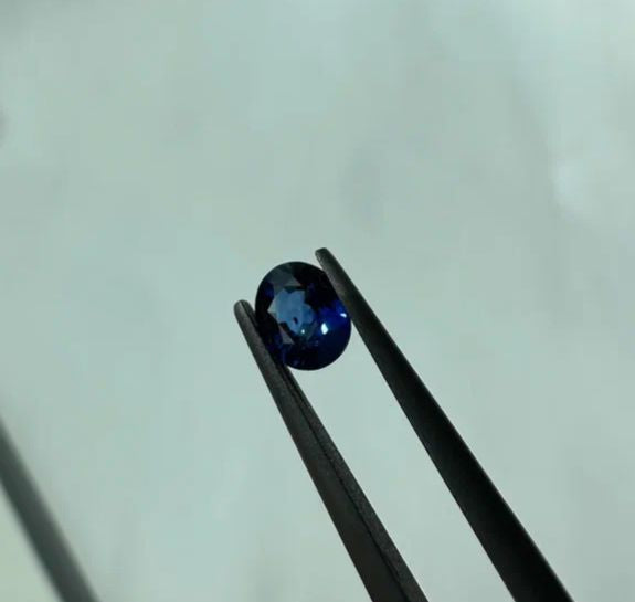 Faceted blue sapphire set