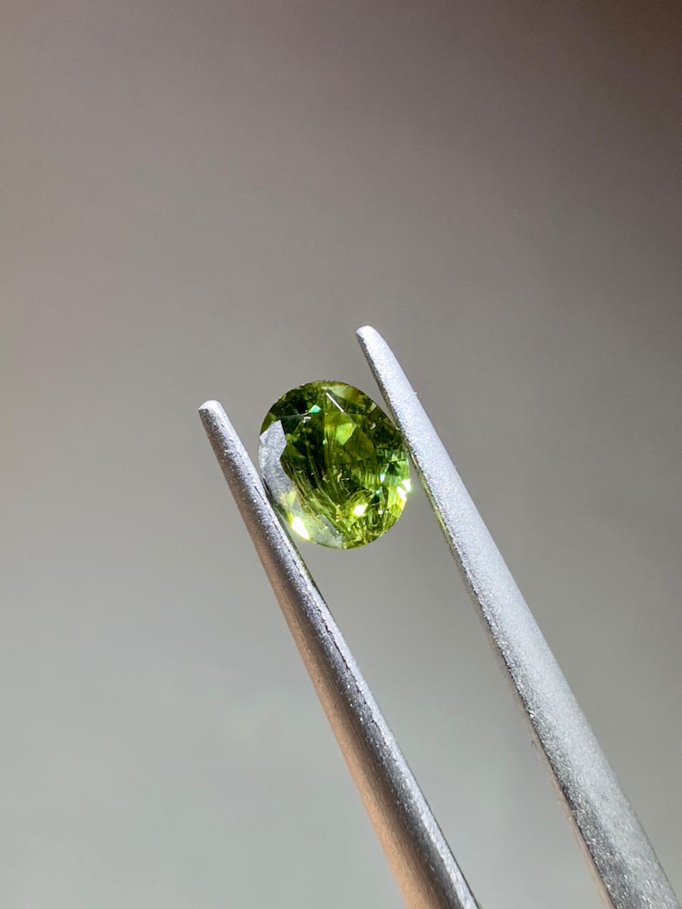 Oval demantoid garnet