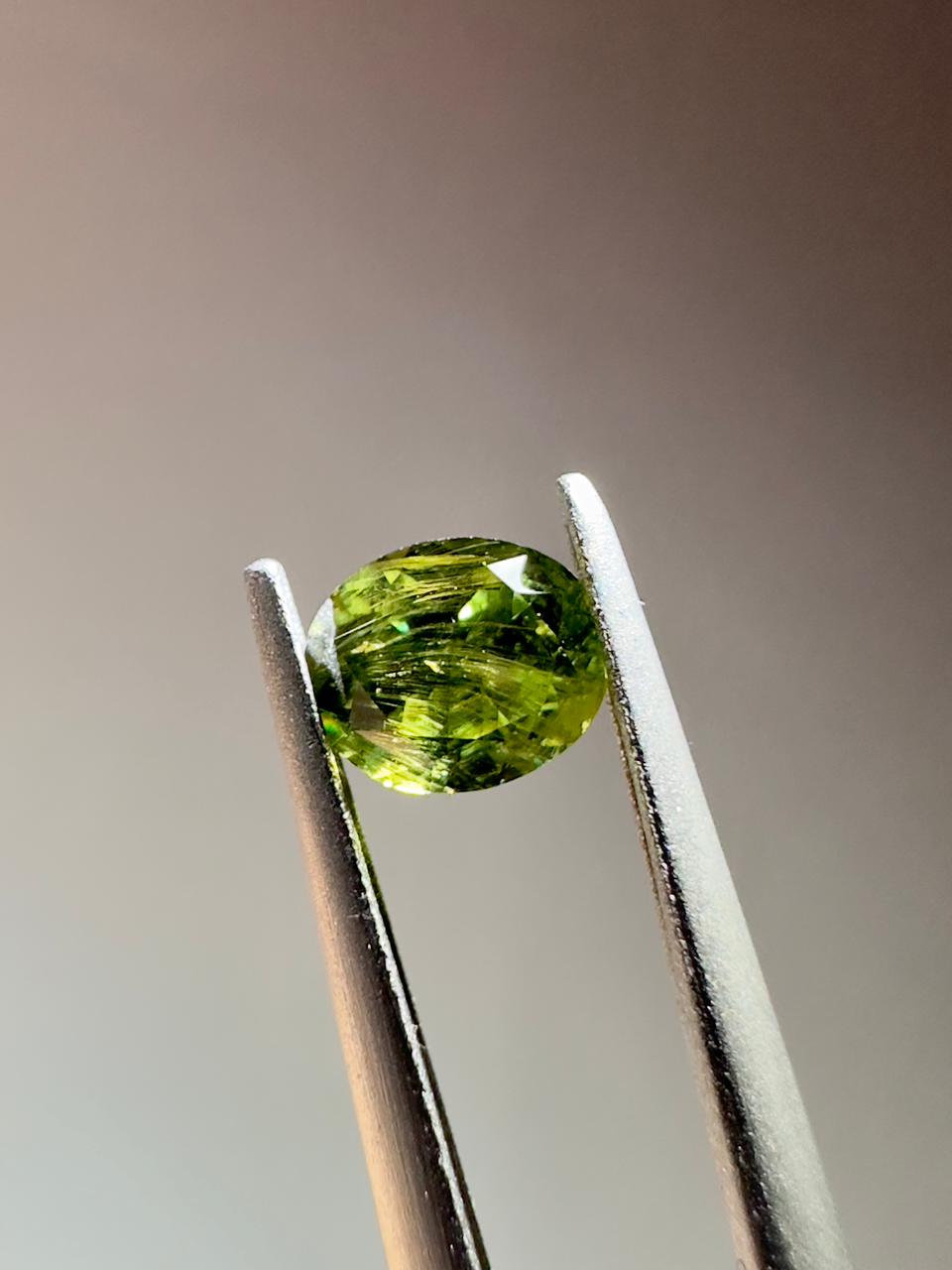 Oval demantoid garnet