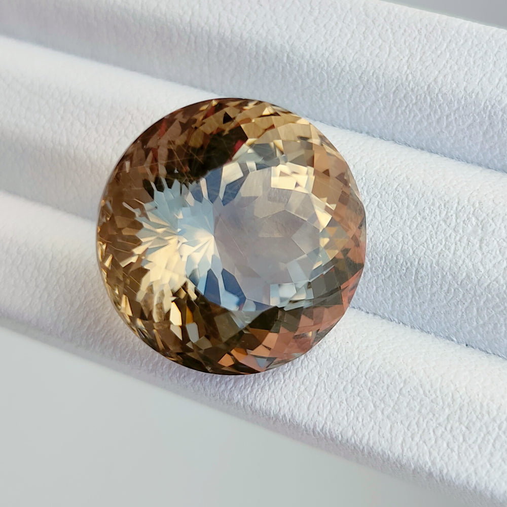 Faceted rutilated smoky quartz 26.5 ct
