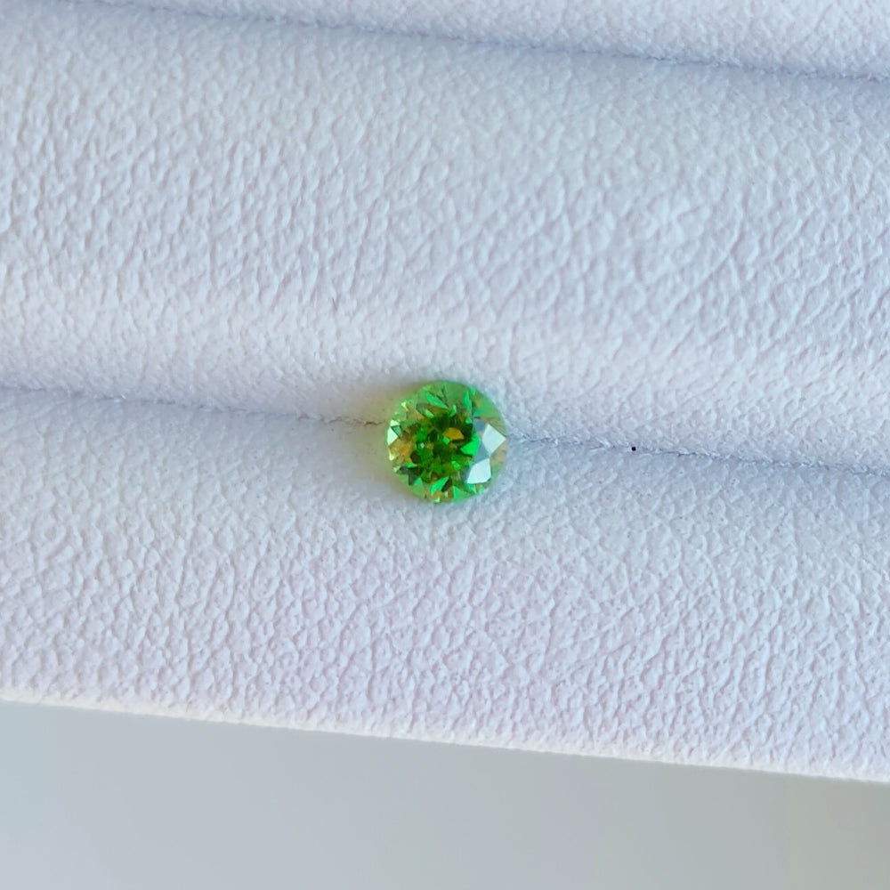 Faceted demantoid garnet 0.13 ct
