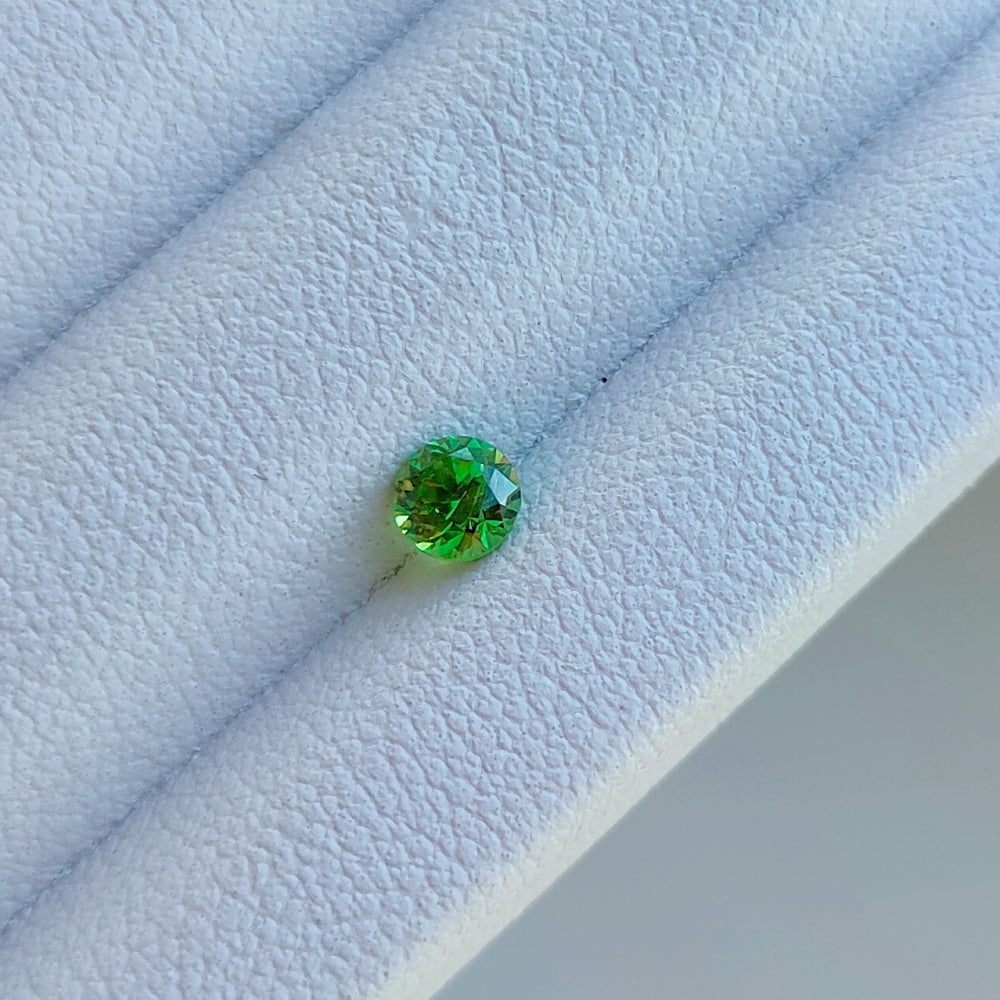 Faceted demantoid garnet 0.13 ct