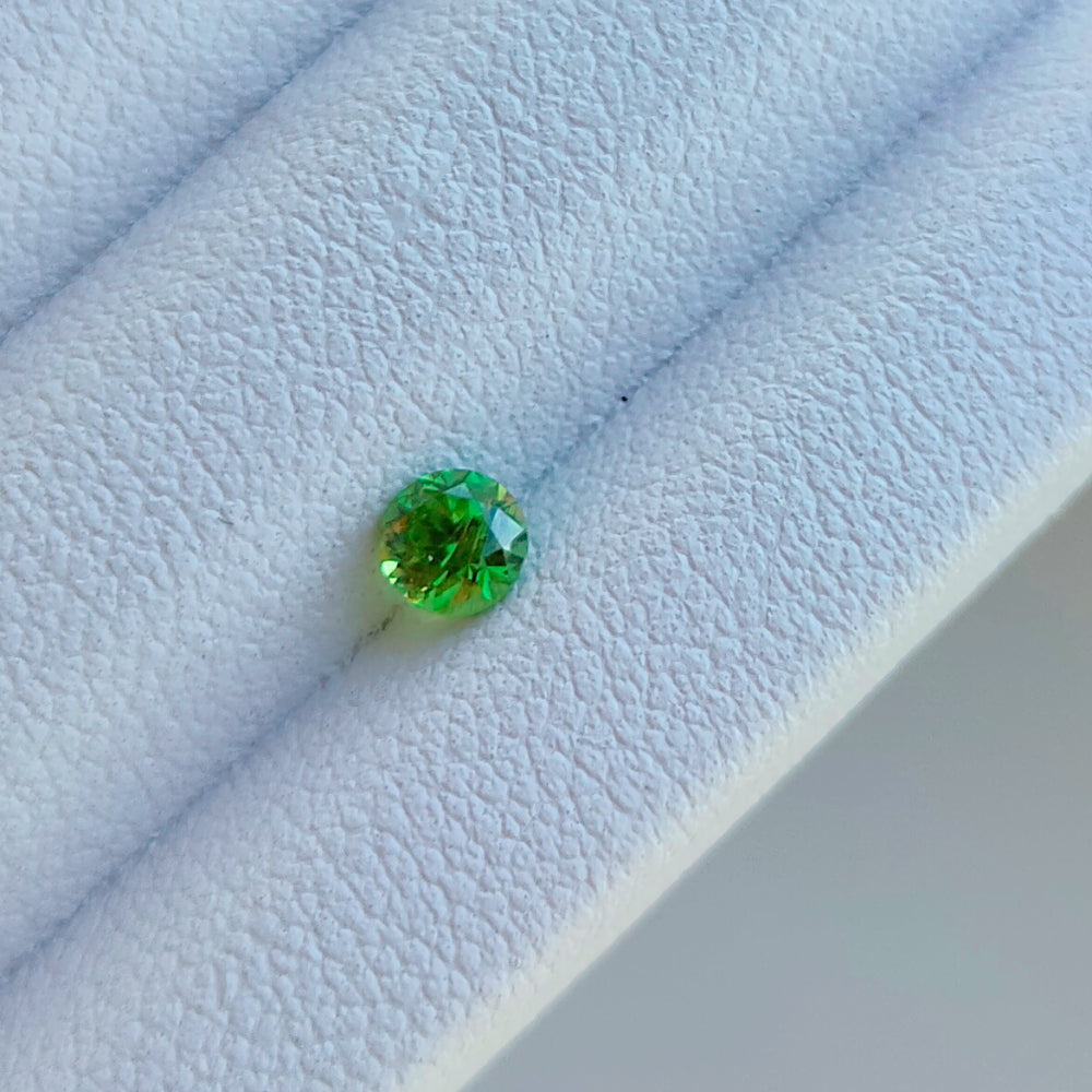 Faceted demantoid garnet 0.13 ct