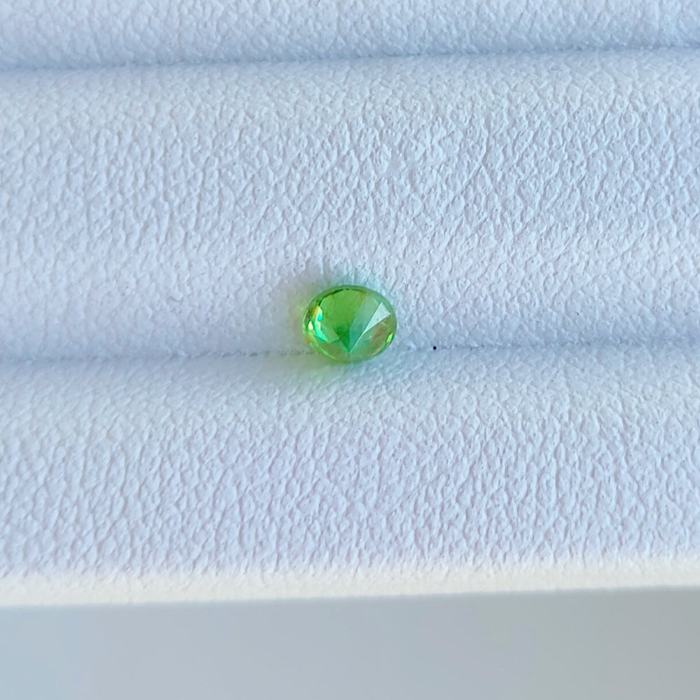 Faceted demantoid garnet 0.13 ct