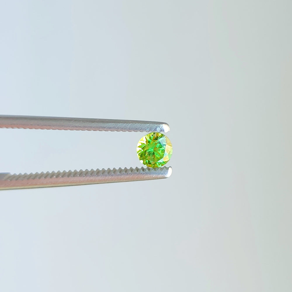 Faceted demantoid garnet 0.13 ct