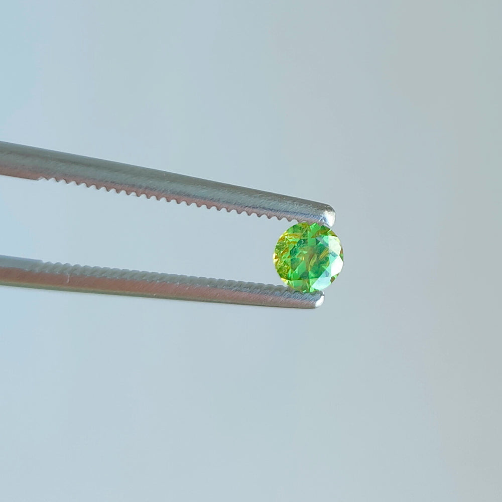 Faceted pair demantoid garnet 0.13 ct