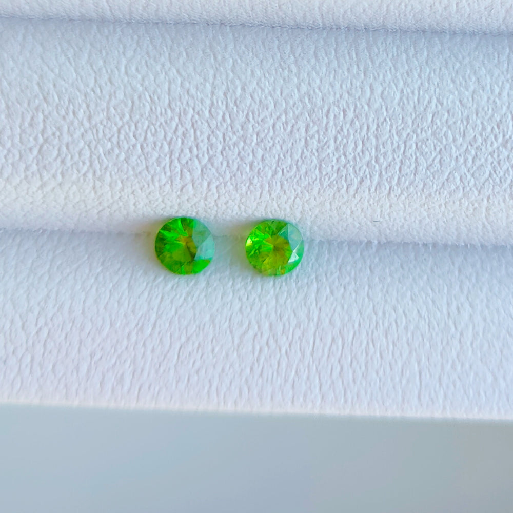 Faceted pair demantoid garnet