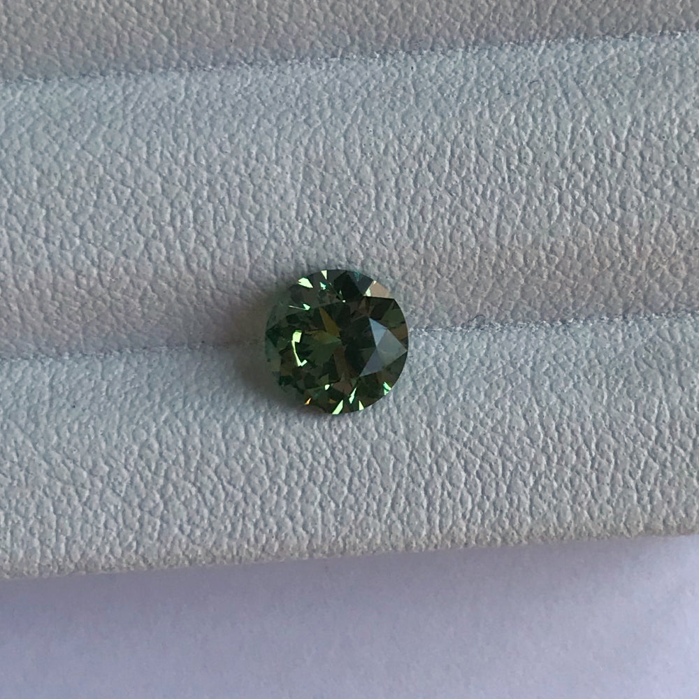 Faceted demantoid garnet 1.25 ct
