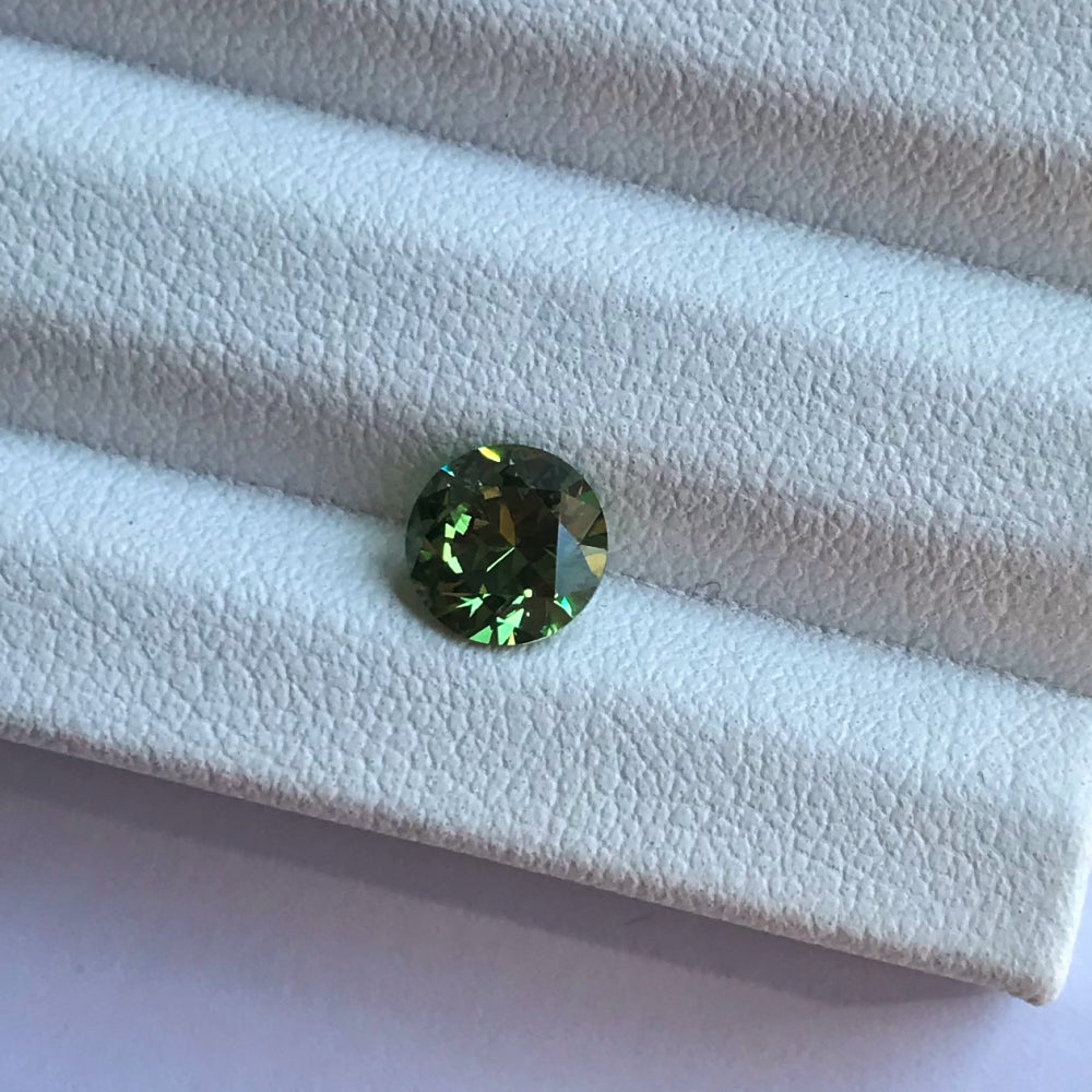 Faceted demantoid garnet 1.25 ct