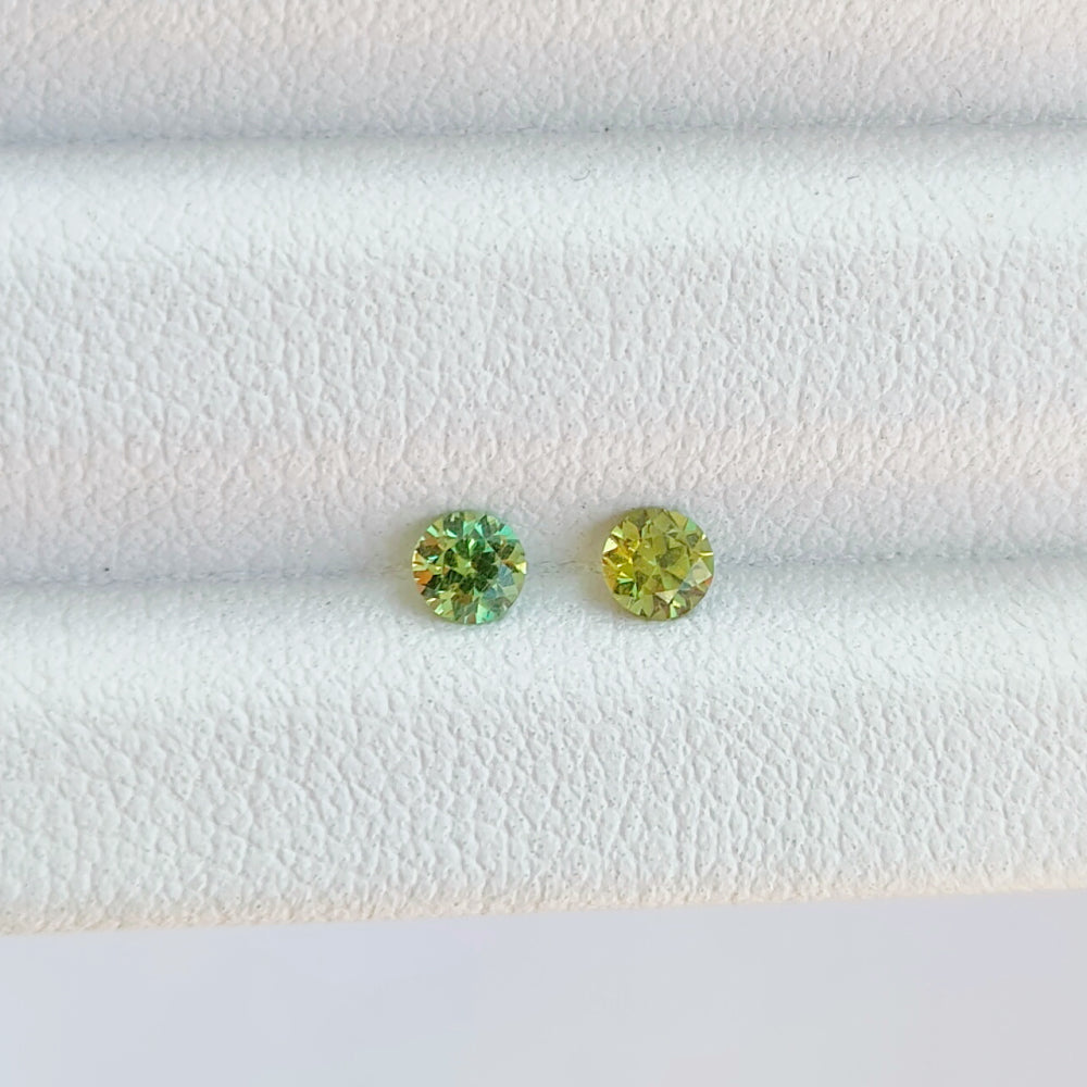Faceted demantoid pair 0.32 ct