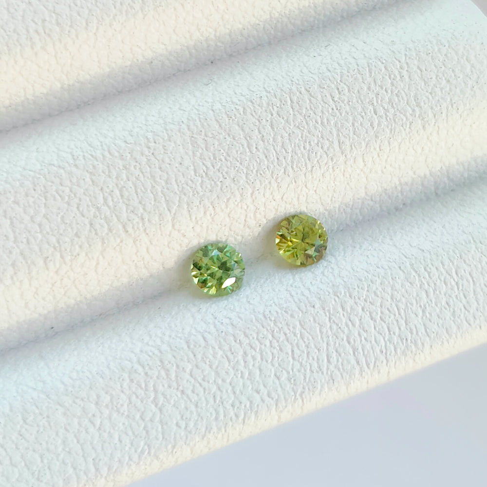 Faceted demantoid pair 0.32 ct