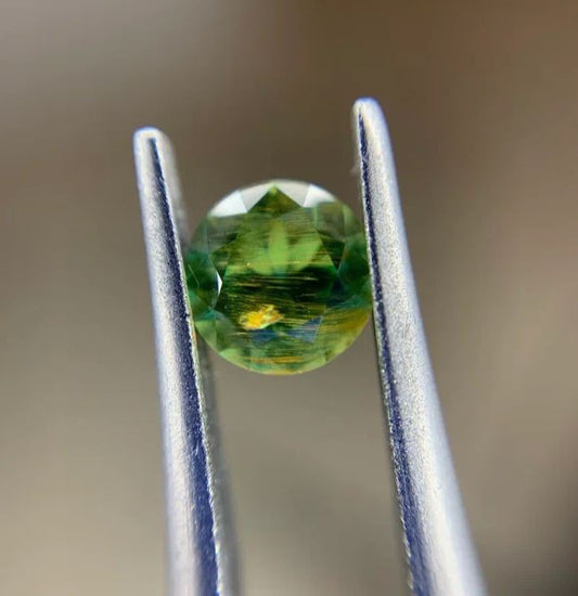 Faceted demantoid 0.55 ct