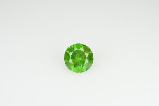 Faceted demantoid 0.6 ct