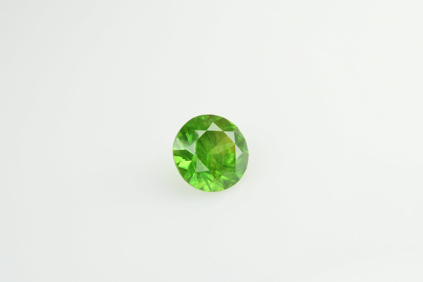 Faceted demantoid 0.6 ct