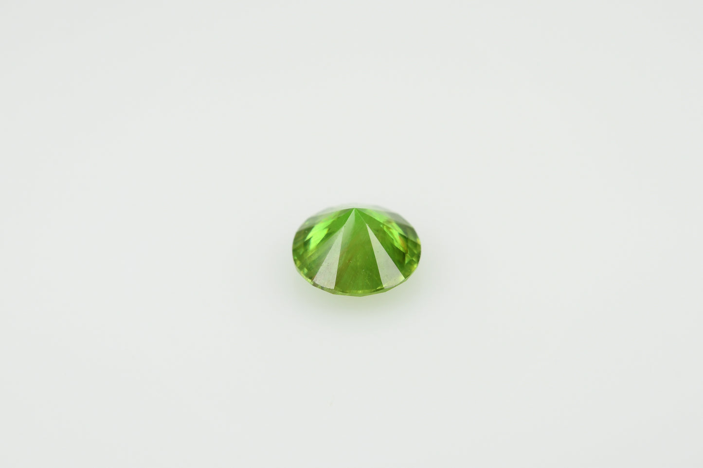 Faceted demantoid 0.6 ct